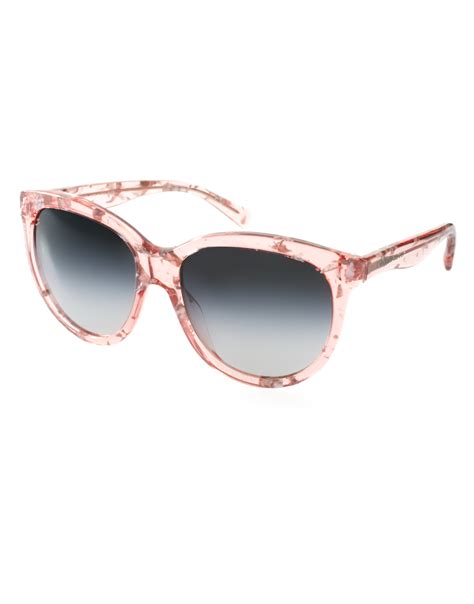 pink dolce and gabbana glasses.